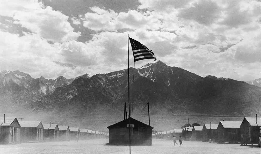 A US flag flies at the Manzanar War Relocation Center, a Japanese-American internment camp, in Manzanar, California, World War II, 3rd July 1942 site of a detention facility for some of the 120,000 Japanese Americans. 