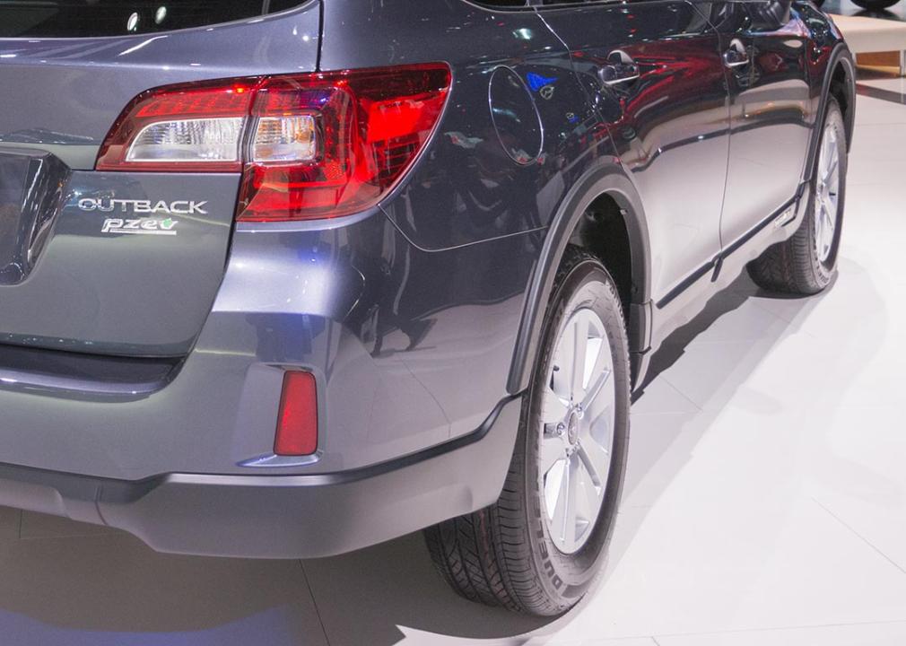 Rear view of a partial zero emissions vehicle, a gray Subaru Outback.
