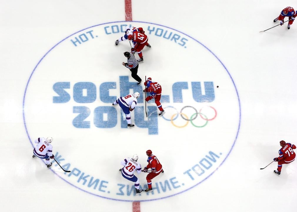 Norway faces off with Russia in men's ice hockey at the Sochi Winter Olympics.