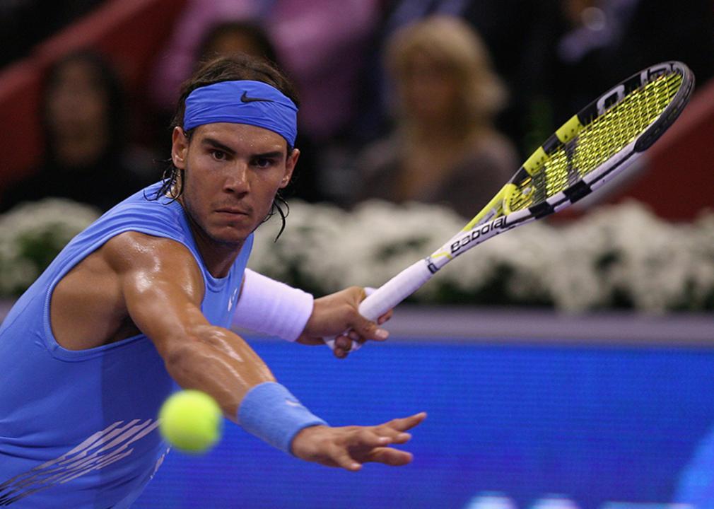 Spanish tennis player Rafael Nadal in action during a match at the Madrid Masters tournament in 2008.