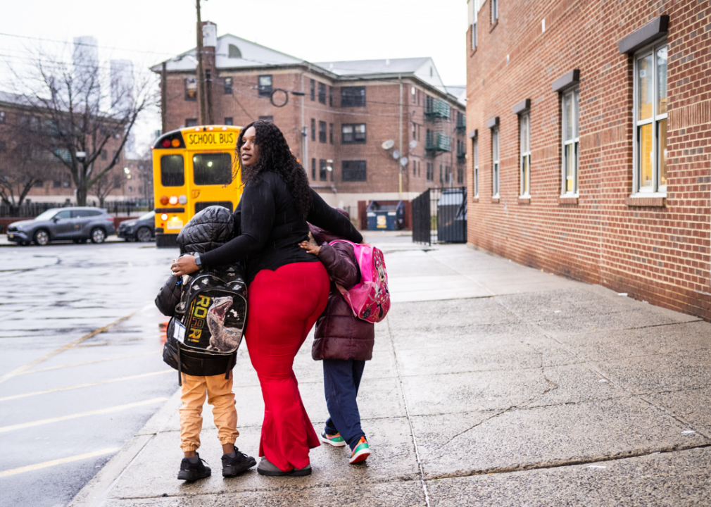 Hannah Allen, who goes to Hudson County Community College, with two of her children at the end of a day, on the way to pick up the third.