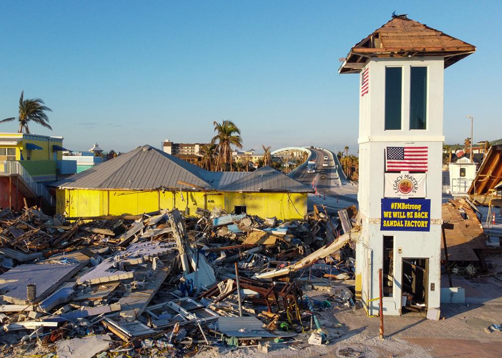 In November 2022, a month after Hurricane Ian hit FL, Fort Myers Beach still had piles of rubble alongshore.