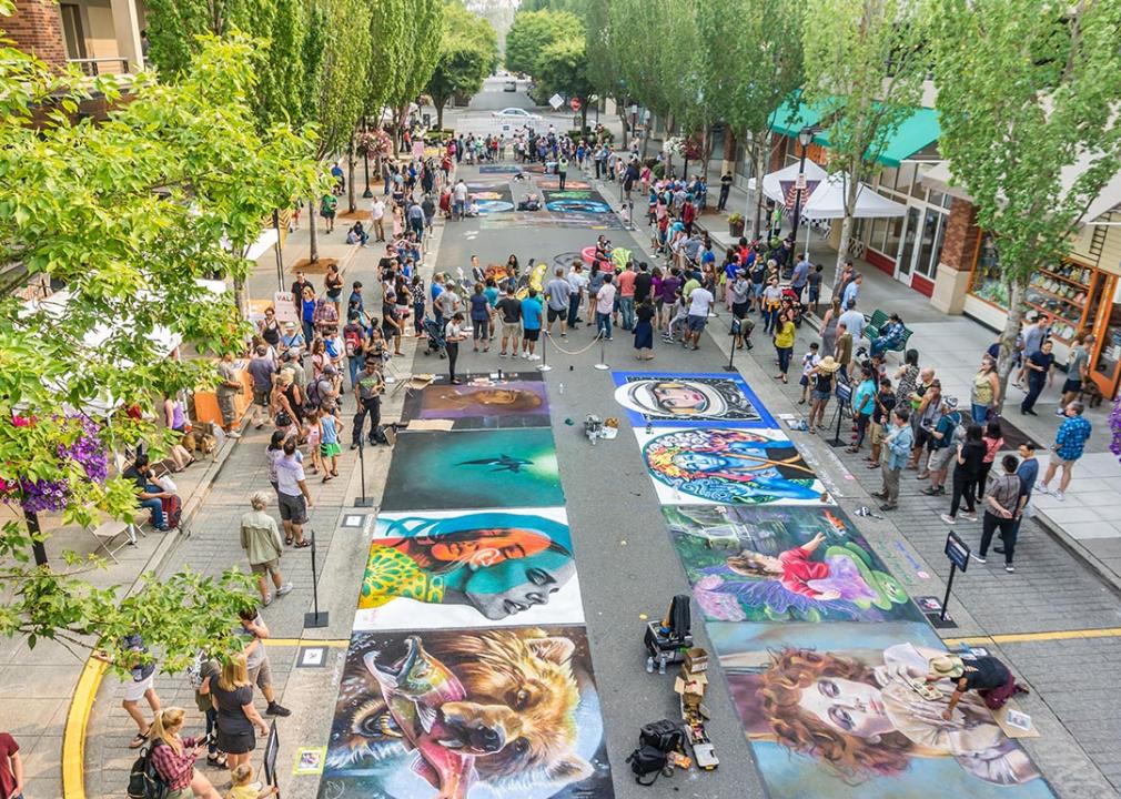 Spectators enjoy art at the Chalkfest event in Redmond, Washington.