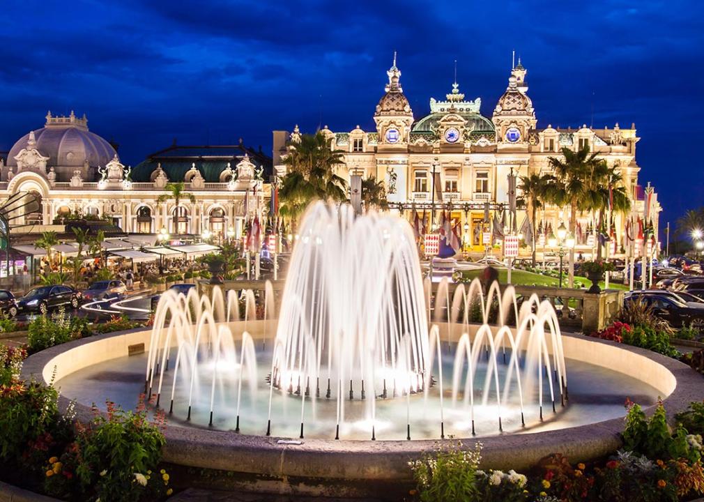 The Monte Carlo Casino, a gambling and entertainment complex in Monte Carlo, Monaco, Cote de Azul seen at twilight.