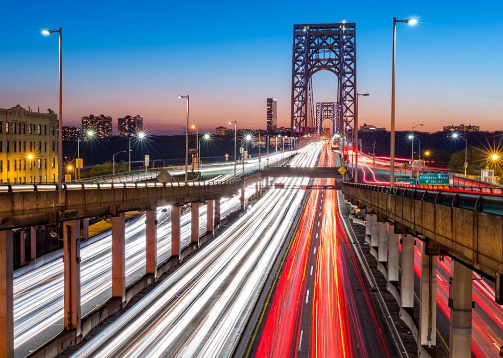 Rush hour traffic with light trails on George Washington Bridge, in New York City.