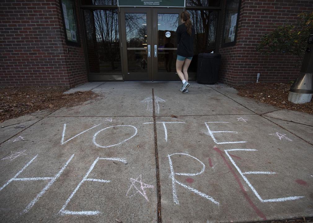 A person enters a polling location on the Michigan State University campus on Election Day.