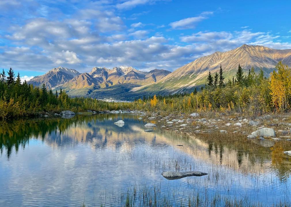 A view of the mountain tops and lake in St. Elias National Park in Wrangell, Alaska.