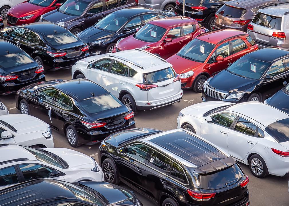 A lot where new and used cars for sale are parked.