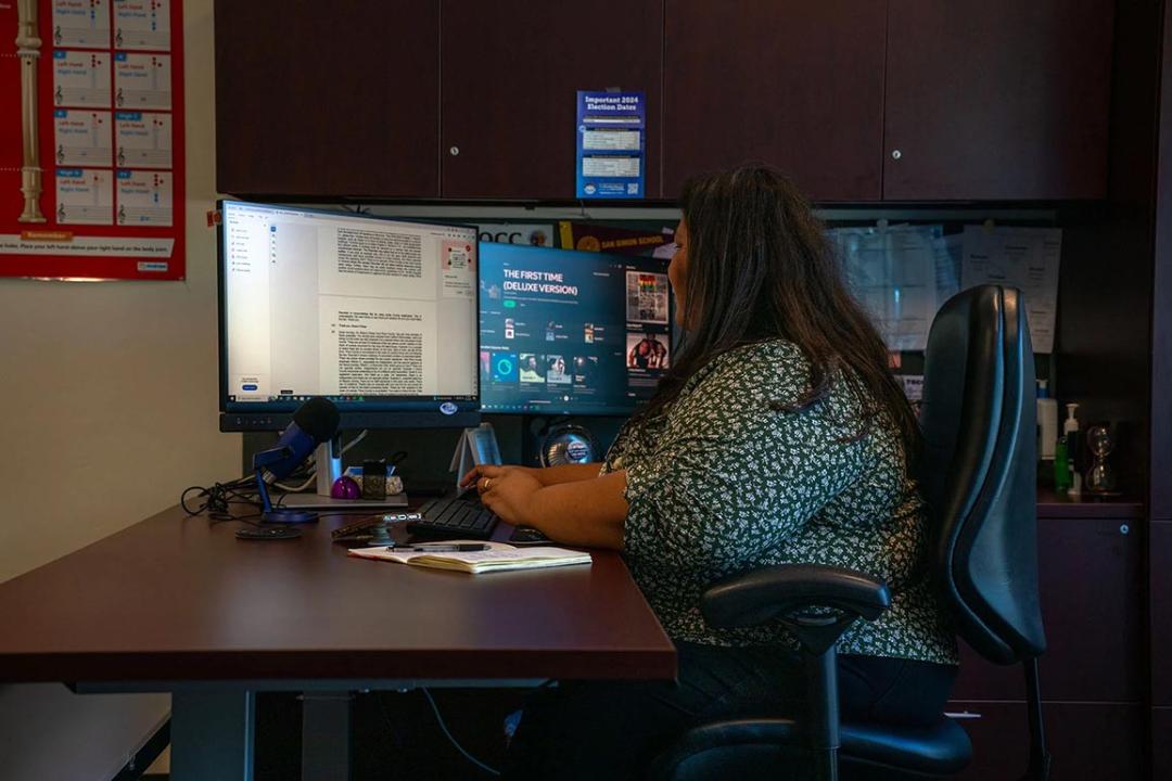 Gabriella Cázares-Kelly works in her office in Tucson, Arizona. 