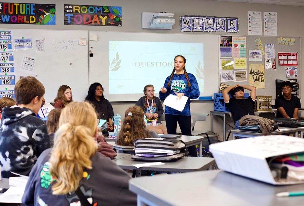 Photo showing Kevin Melrose’s eighth grade social studies class at Westlane Middle School has focused on teaching democracy through student council elections.