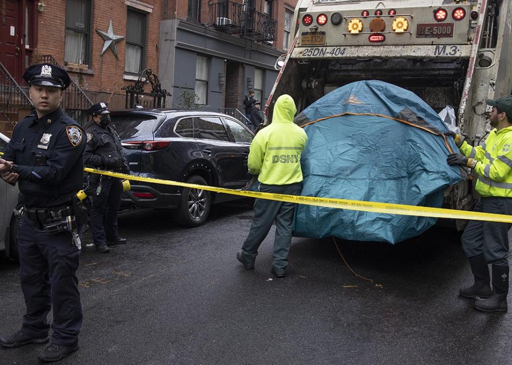 Unhoused people have property rights, too Police enforce a sweep of a homeless encampment, throwing tents and other possessions of the homeless in a trash truck in the East Village neighborhood of New York City.