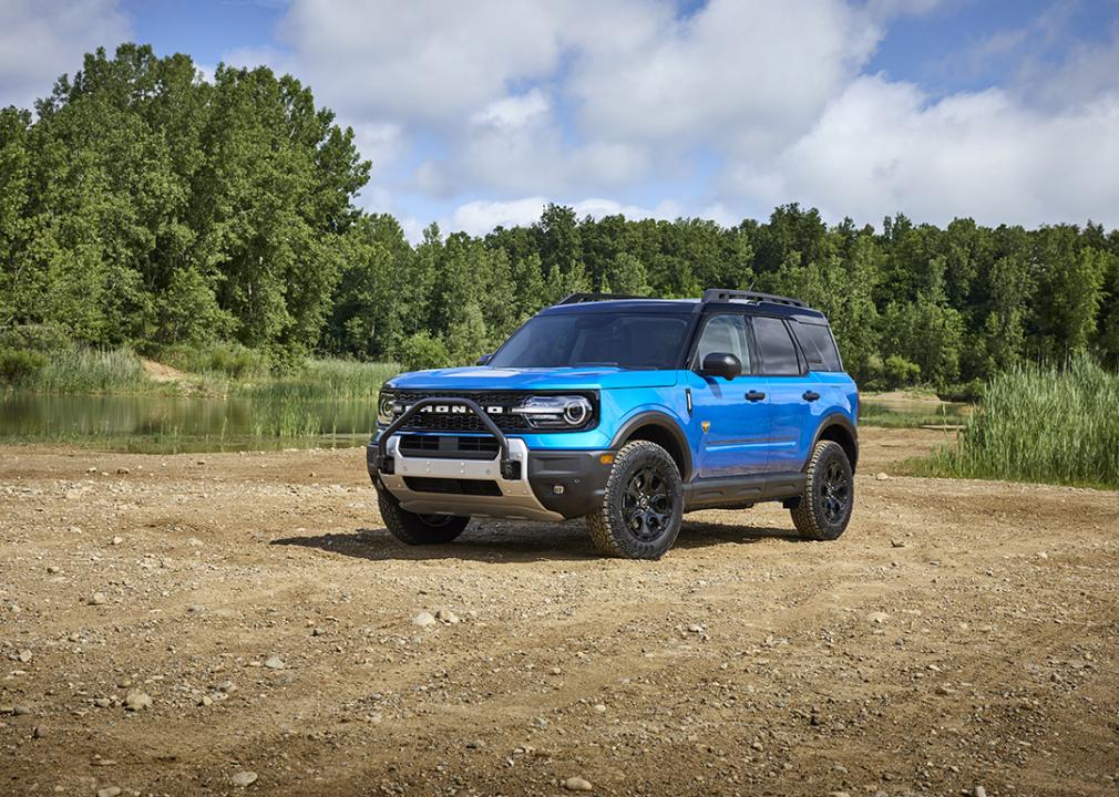 A blue 2025 Ford Bronco Sport parked on a rocky road.