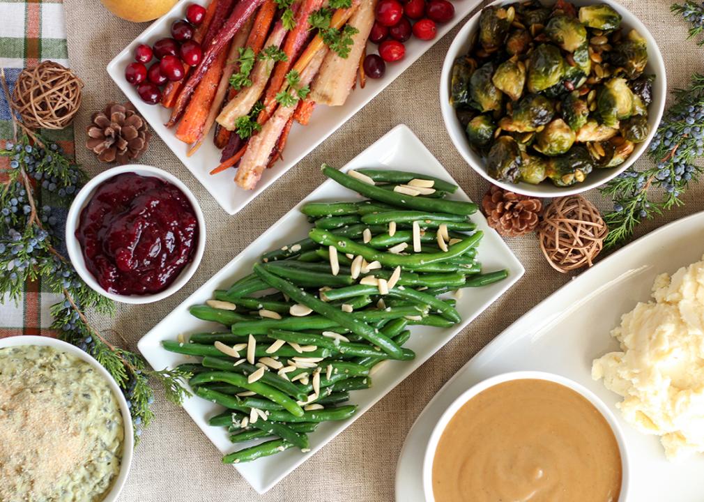 An table of assorted holiday side dishes and recipes.