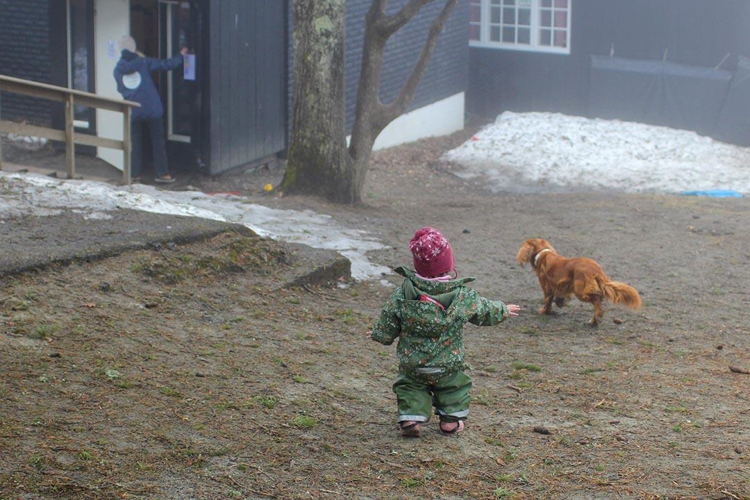 A toddler plays outside at the Turi Sletners child care program in north Oslo.