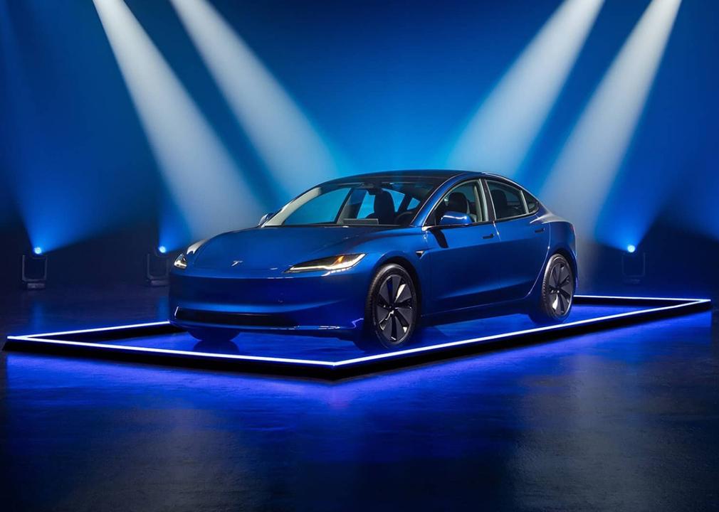 A blue 2025 Tesla Model 3 as displayed for the Edmunds 2025 Top Rated Awards.