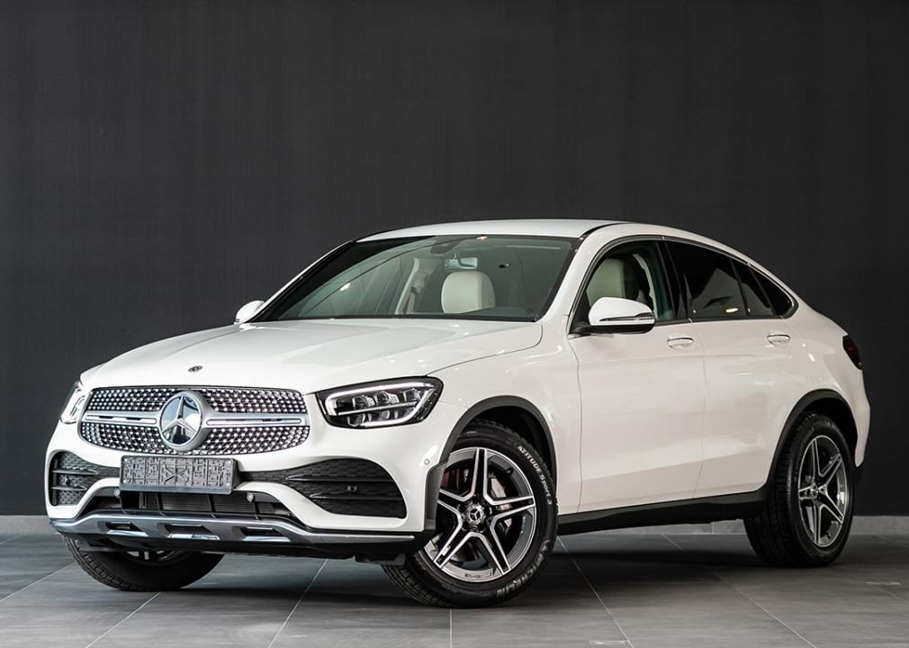 A white Mercedes Benz GLC class SUV.