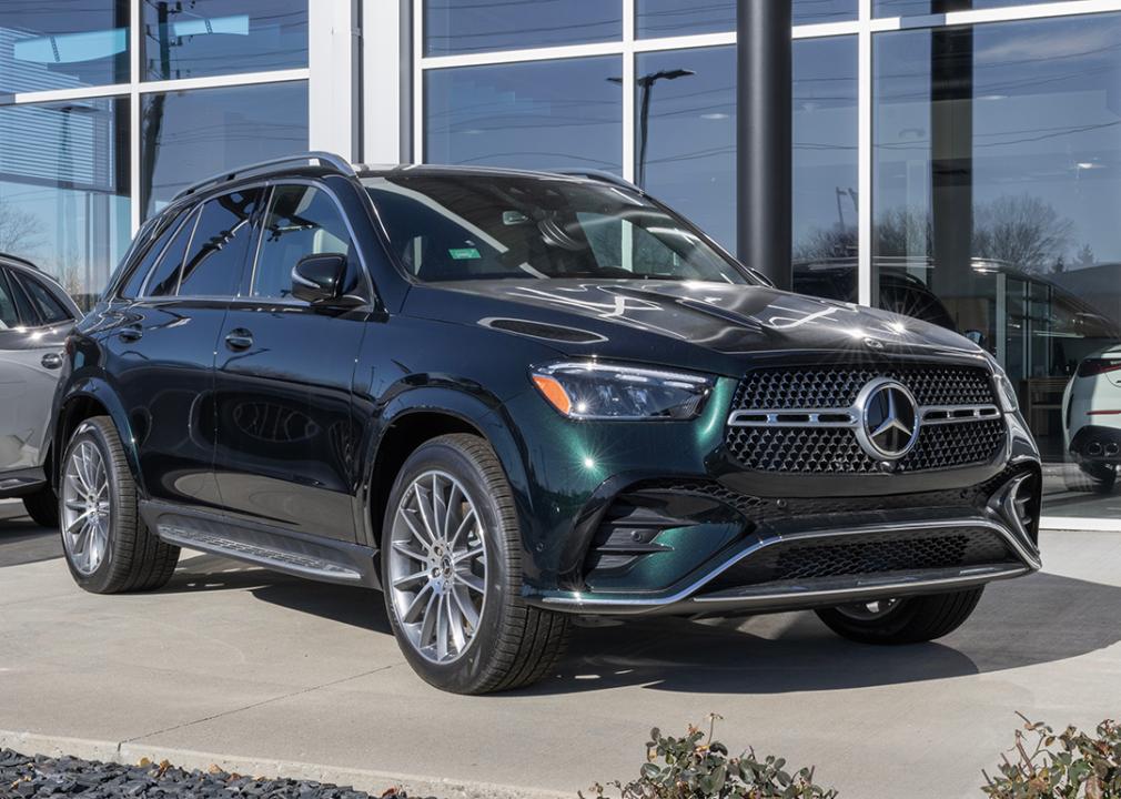 A green Mercedes Benz GLE class SUV.