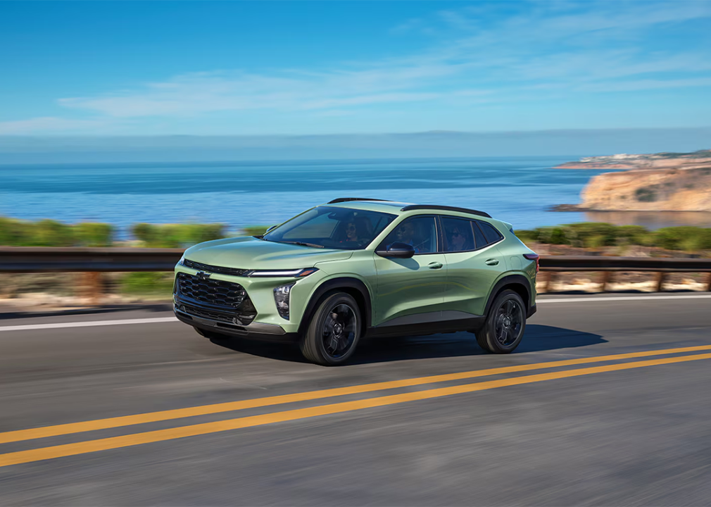 A green 2025 Chevrolet Trax on the road.