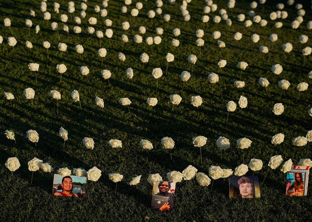 Pictures of loved ones lost to gun violence are displayed during a vigil in honor of victims of gun related deaths at Public Square Park in Nashville, Tennessee.