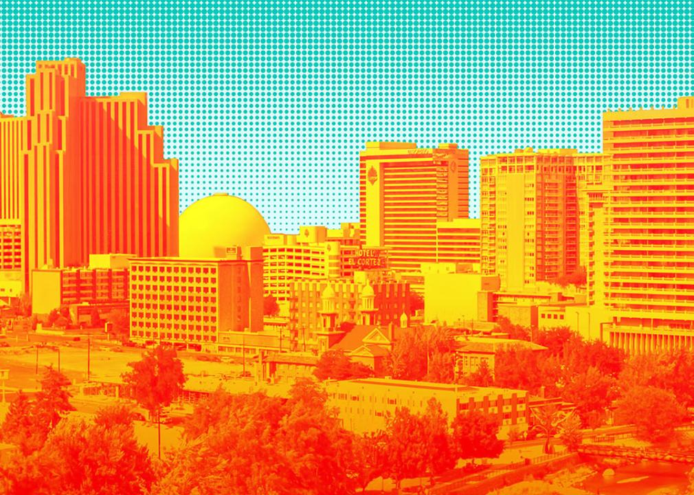 Illustration showing an intensely saturated skyline of a city against a blue background.