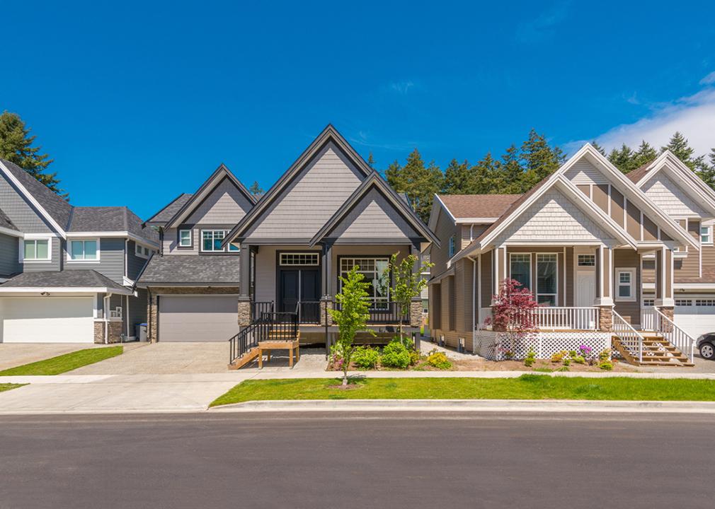 A row of contemporary modern three-bedroom homes.