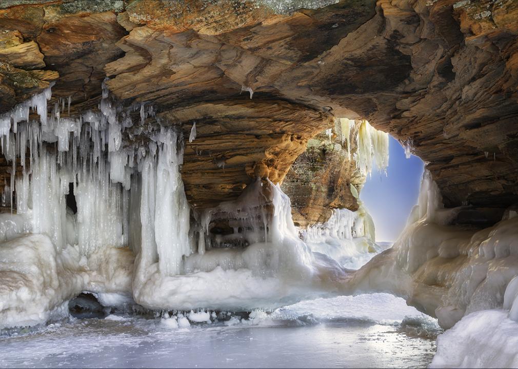 A beautiful natural arch formed on Lake Superior covered in ice.