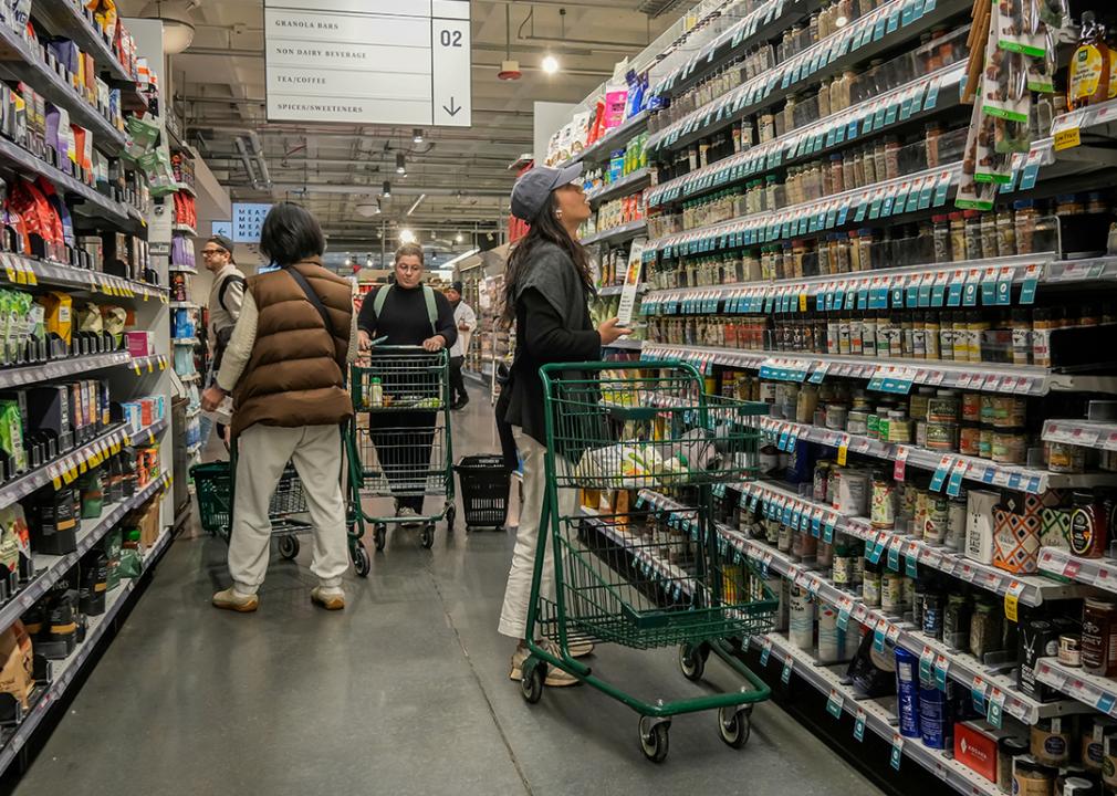 Consumers looking at the tea, coffee and spices aisle in a supermarket in New York.