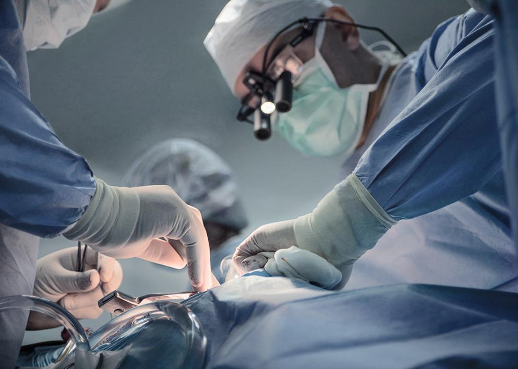 Doctors perform surgery of a cardiac stent transplant in a hospital.