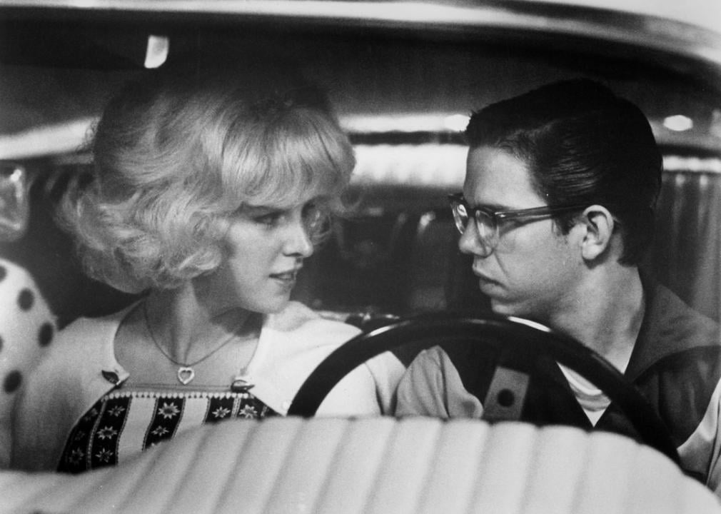 Actors Candy Clark and Charles Martin Smith in a scene from the classic film 'American Graffiti.'