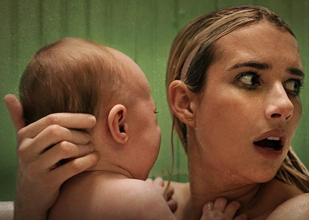 Emma Roberts with a baby in the 2022 film 'Abandoned.'