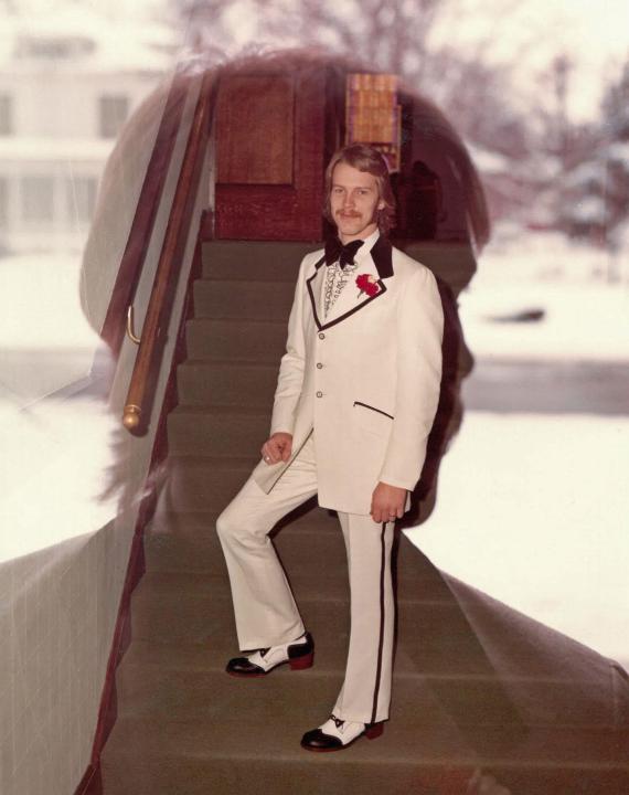 "My dad on his wedding day on 12/29/73" A man standing for a portrait on his wedding day