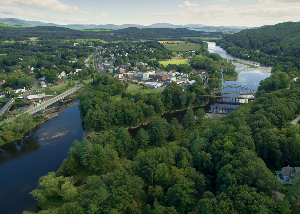 New Hampshire: Grafton County Aerial view of The Connecticut River and Woodsville.