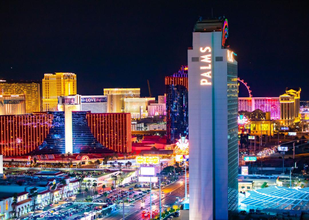 View of Las Vegas at night with Palms hotel in foreground.