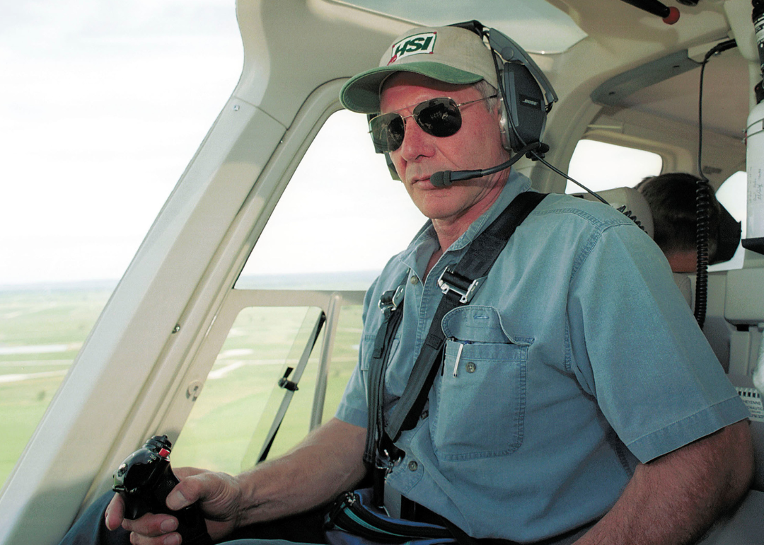 Harrison Ford  flying a helicopter near Jackson Wyoming