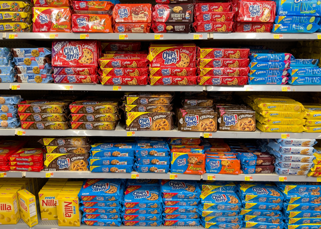 Variety of Nabisco cookies on supermarket shelf.
