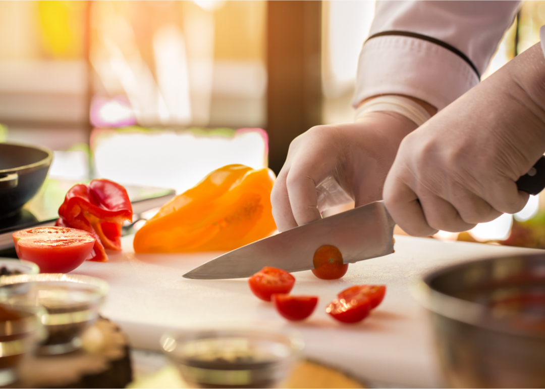 Person chopping vegetables