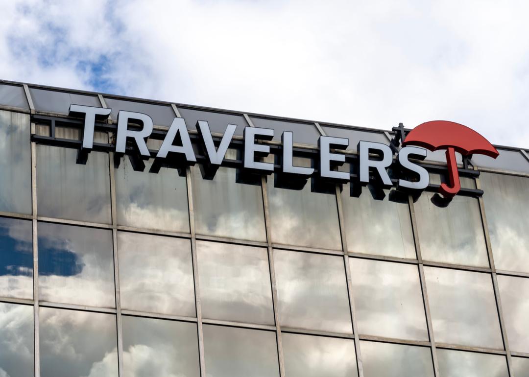 Close up of Travelers sign on building.