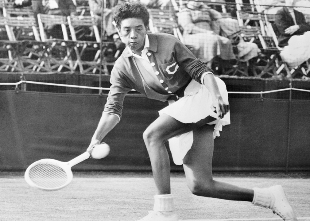 Althea Gibson competing in tennis match.