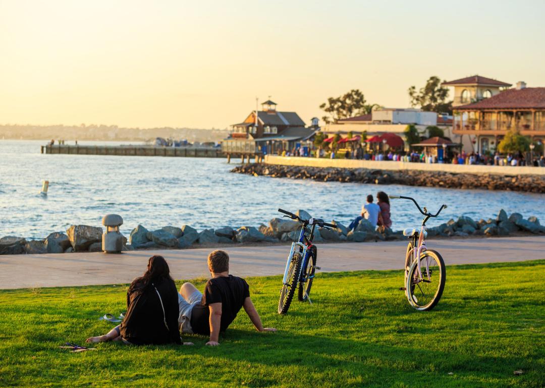 People with bicycles at San Diego Waterfront Park.