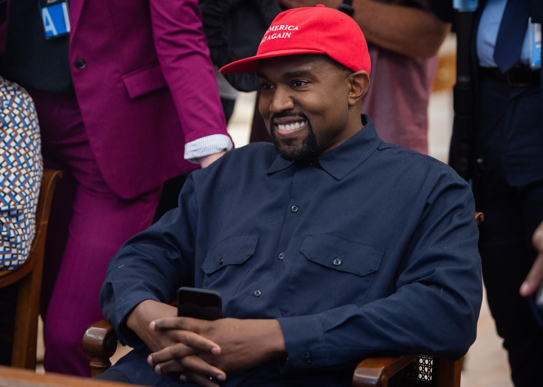 Kayne West wearing “Make America Great Again” hat.