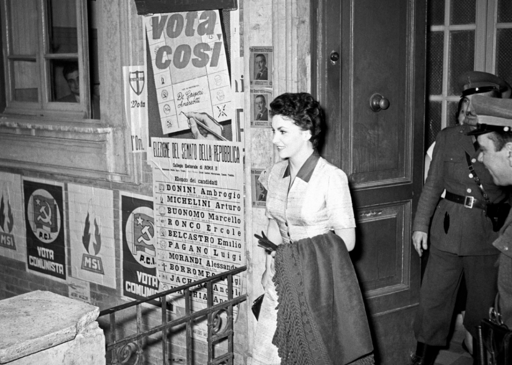 Actress Gina Lollobrigida exits the polls in Rome in 1953