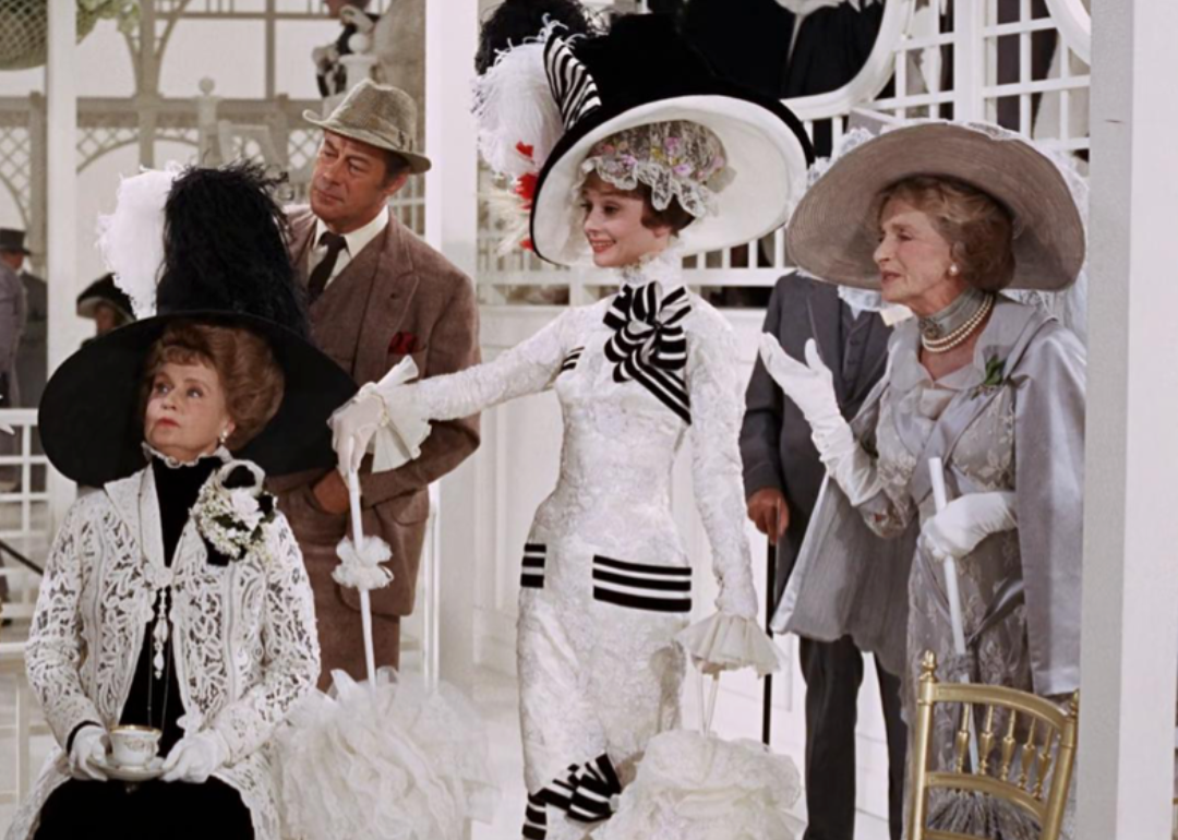 Audrey Hepburn and cast in a scene from ‘My Fair Lady.'