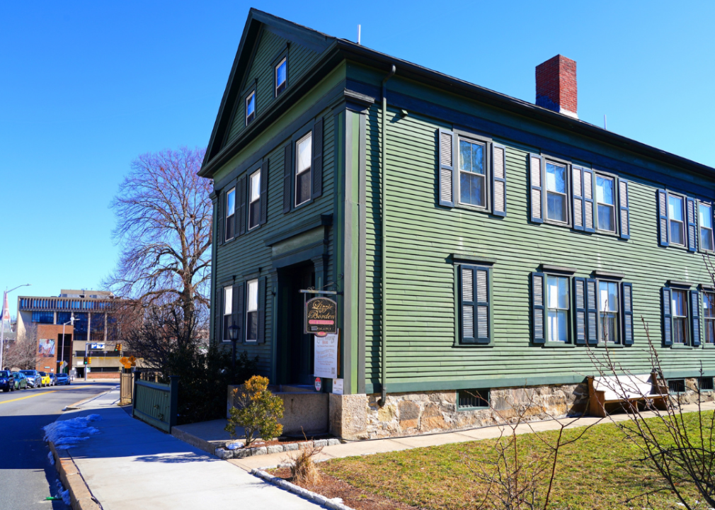 Exterior view of the Lizzie Borden House, a two story green house on a Second Street.