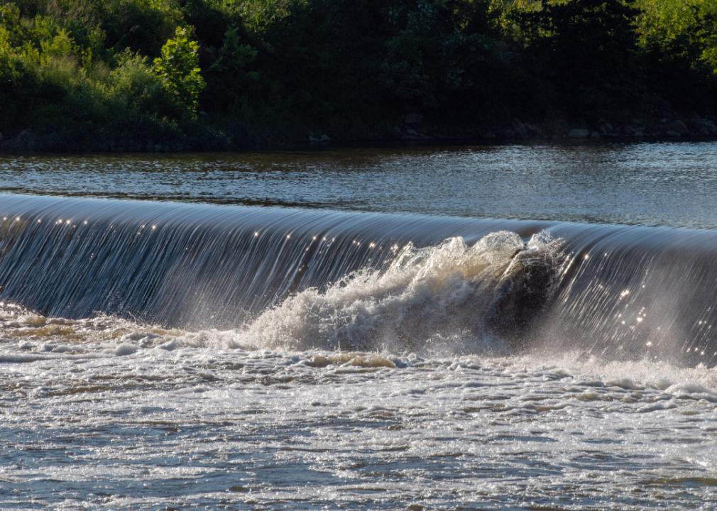 Small breach in a dam at a Kansas river.