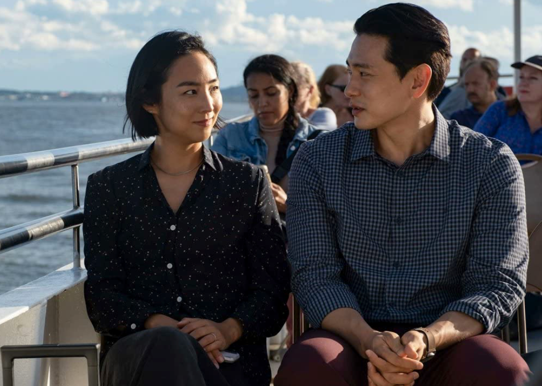 Teo Yoo and Greta Lee in ‘Past Lives’.