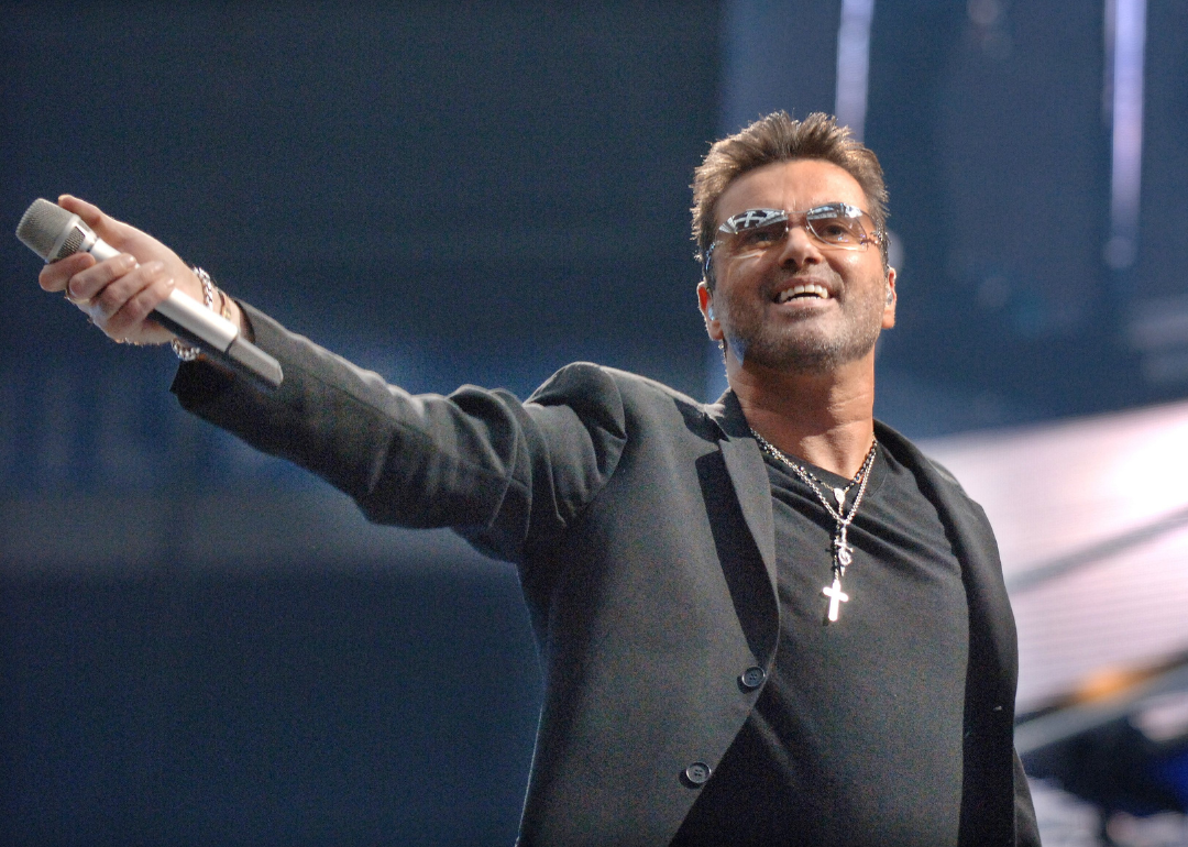 George Michael performing on stage.