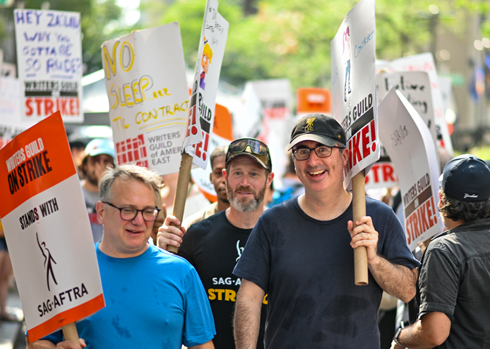 John Oliver joins Writers Guild of America on the picket line in New York City.
