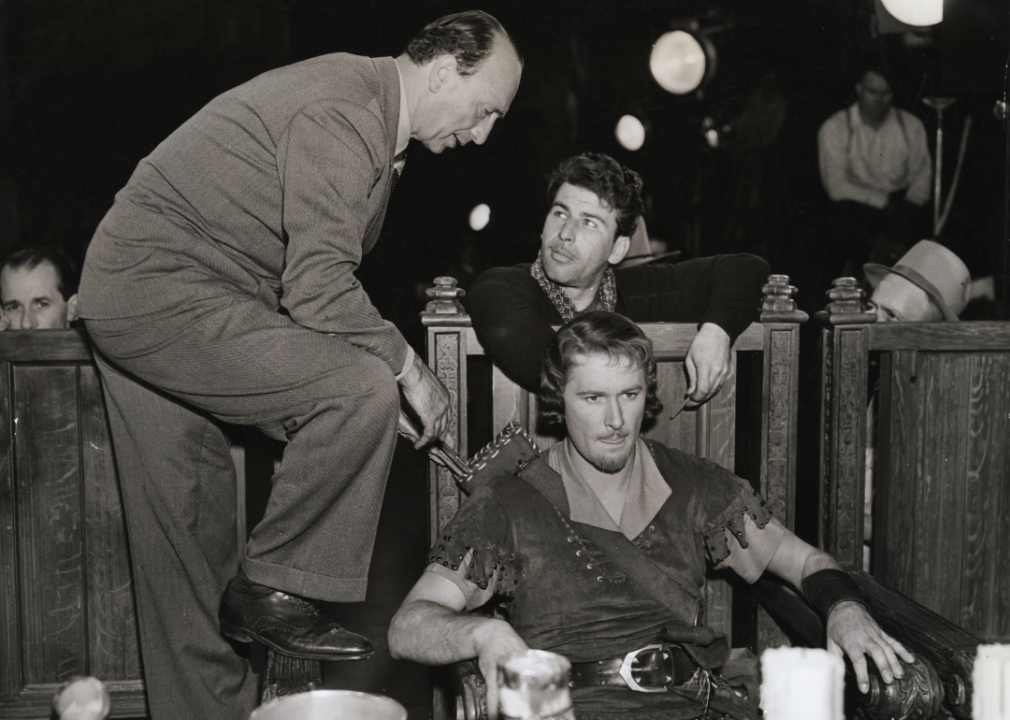 Michael Curtiz and Errol Flynn on the set of ‘The Adventures of Robin Hood’.