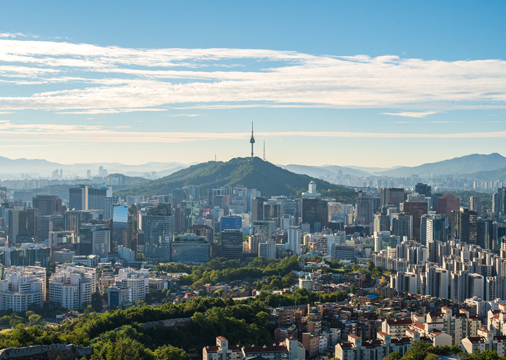 Inwangsan Mountain and Seoul cityscape at dawn.