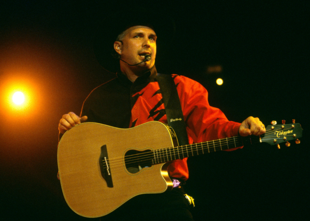 Garth Brooks performing onstage.